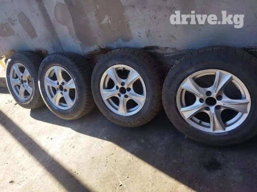 Продаю титановые диски с зимними резинами и 185/70/14 R
