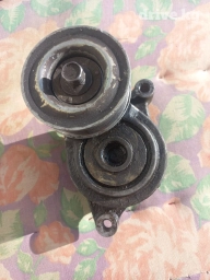 Натяжной ролик.мазда демио жаны кузовко рабочий звук жок подщибник