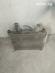 Радиатор Тойота ист оригинал с вентилятором