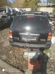 Запчасти Мазда трибют