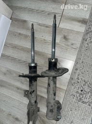 Передний амортизатор Kia Новый, Оригинал, Япония