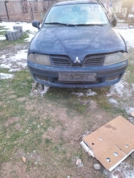 Все запчасти на митсубиси каризма 2002 год.Движок хороший не дымит не