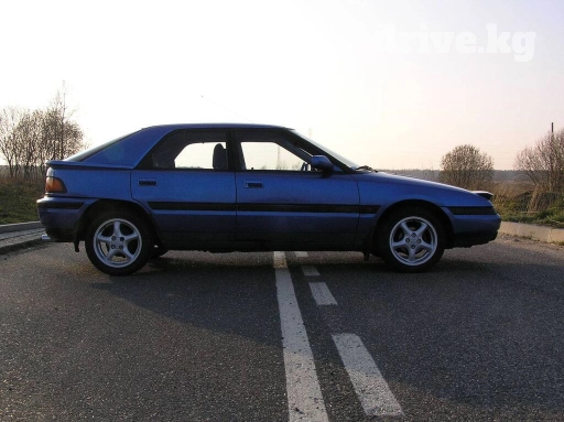 Задний спойлер Mazda 1992 г., Б/у