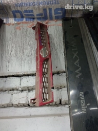 Ниссан Сани 90г 
решетка радиатора