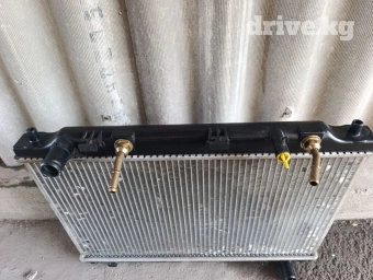 Решетка радиатора Mazda 2005 г., Новый, Оригинал