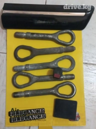 Буксировочный крюк, шильдик Elegance, заглушка АКПП, заглушка порога