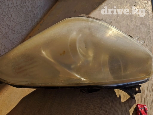 Передняя левая фара Toyota 2006 г., Б/у, Оригинал, Германия