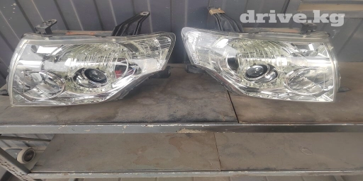 Комплект передних фар Mitsubishi 2006 г., Б/у, Оригинал, Германия