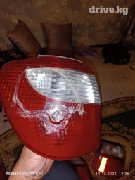 Задний левый стоп-сигнал Mazda 2001 г.