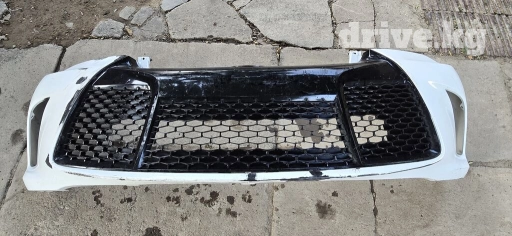 Продаю передний бампер Тойота Капри 55 Американец оригинал после