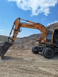 Экскаватор, Hyundai, 2012 г., Колесный