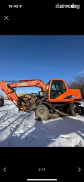 Экскаватор, Doosan, 2009 г., Колесный